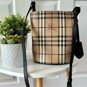 BURBERRY haymarket check print LORNE bucket crossbody bag in black.